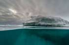 An over-under view of an iceberg Vibebukta-Austfonna-Norway Art Print